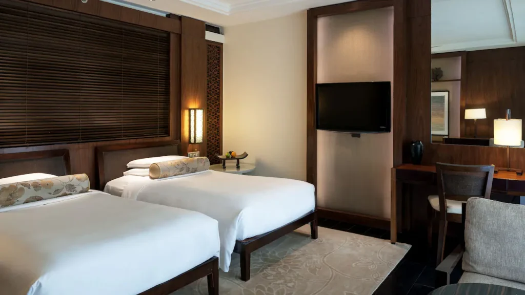 Twin Beds With Balcony Garden View